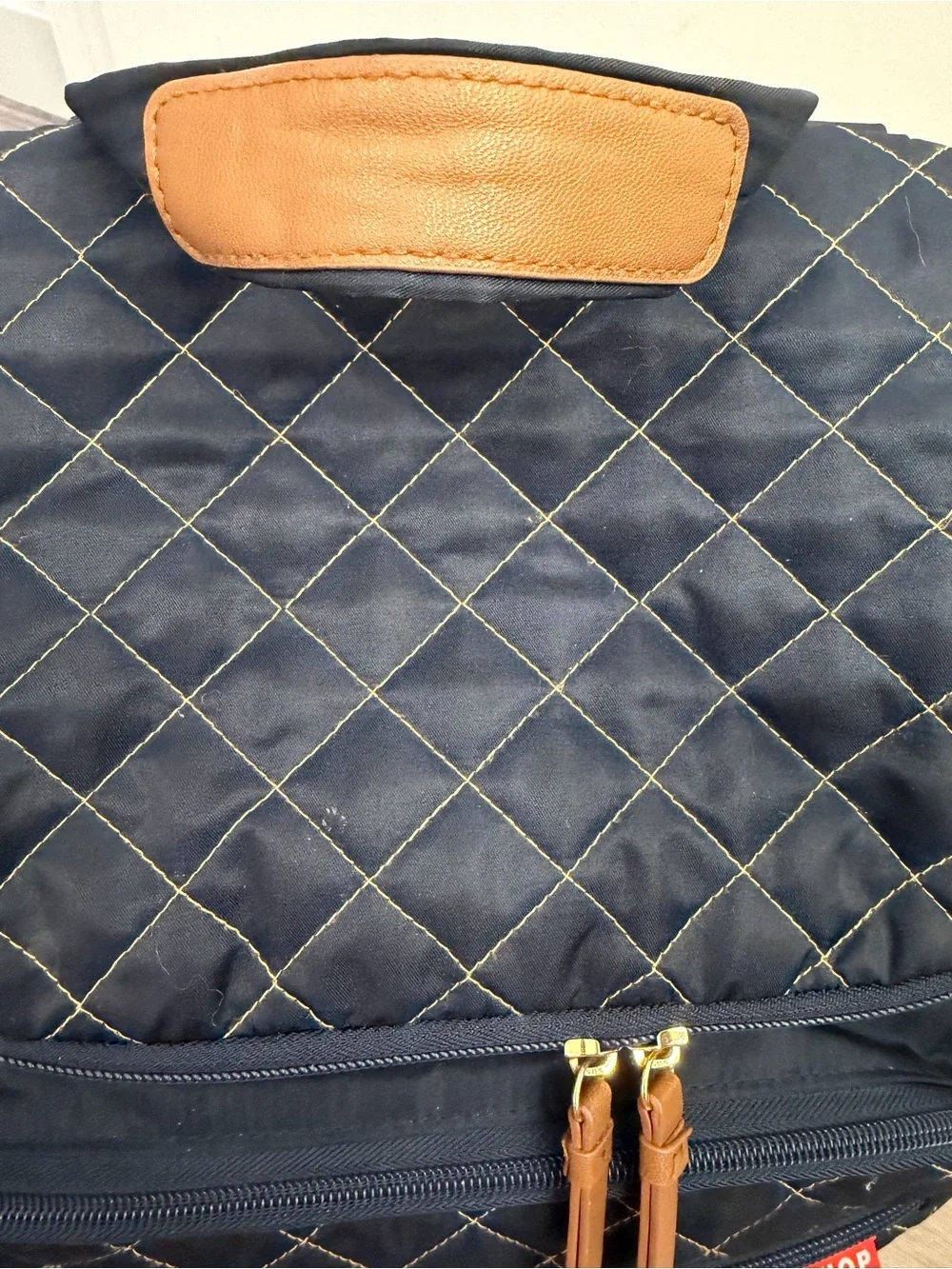 Skip Hop Navy Quilted Backpack with Tan Accents